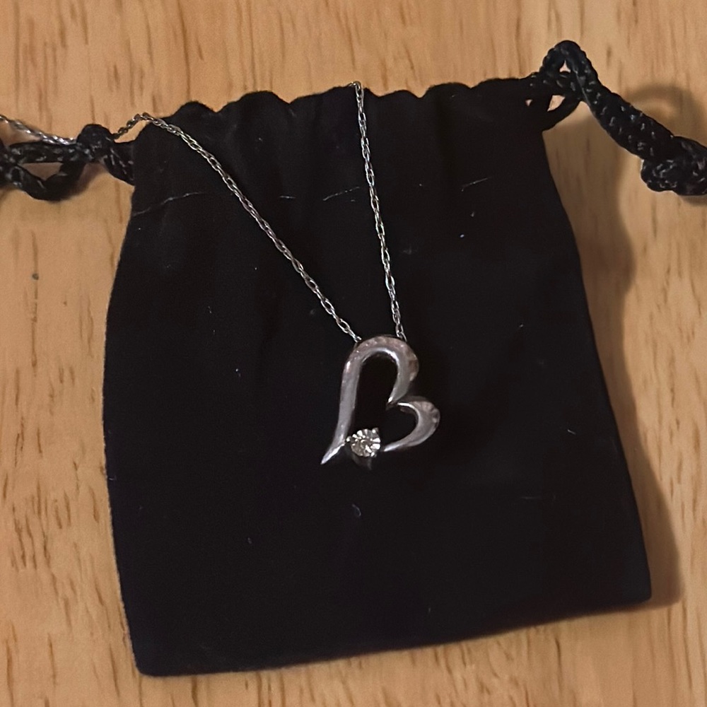 Heart necklace with small diamond inset